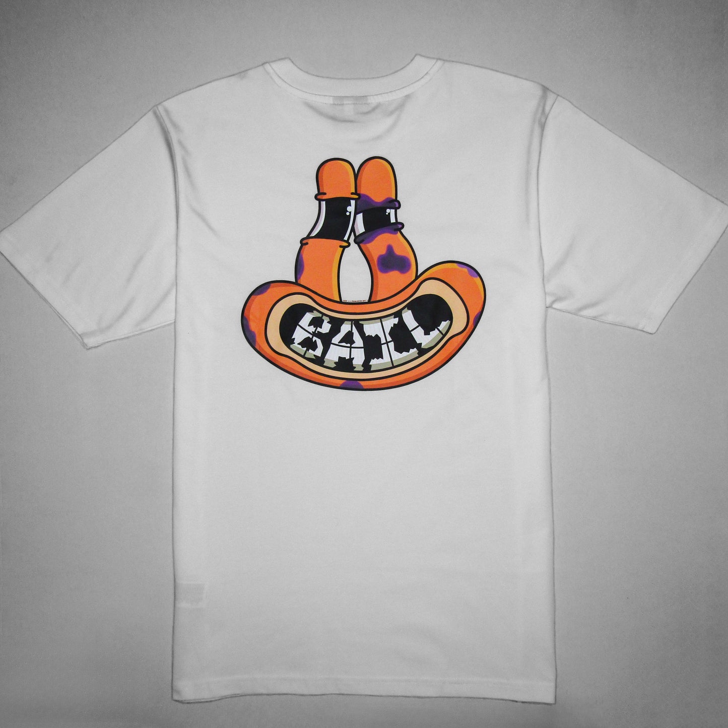 Lifestyle photography featuring a 100% cotton white streetwear t-shirt with "BAIL" in a bold,  bubbly orange font. The apparel is hung on a white wall by a wooden clothes hanger and is framed by green plants, a Japanese peace lily and a monstera; a pink skateboard is partially visible, along with an incense burner on a black table. The vibe is calm and cosy.