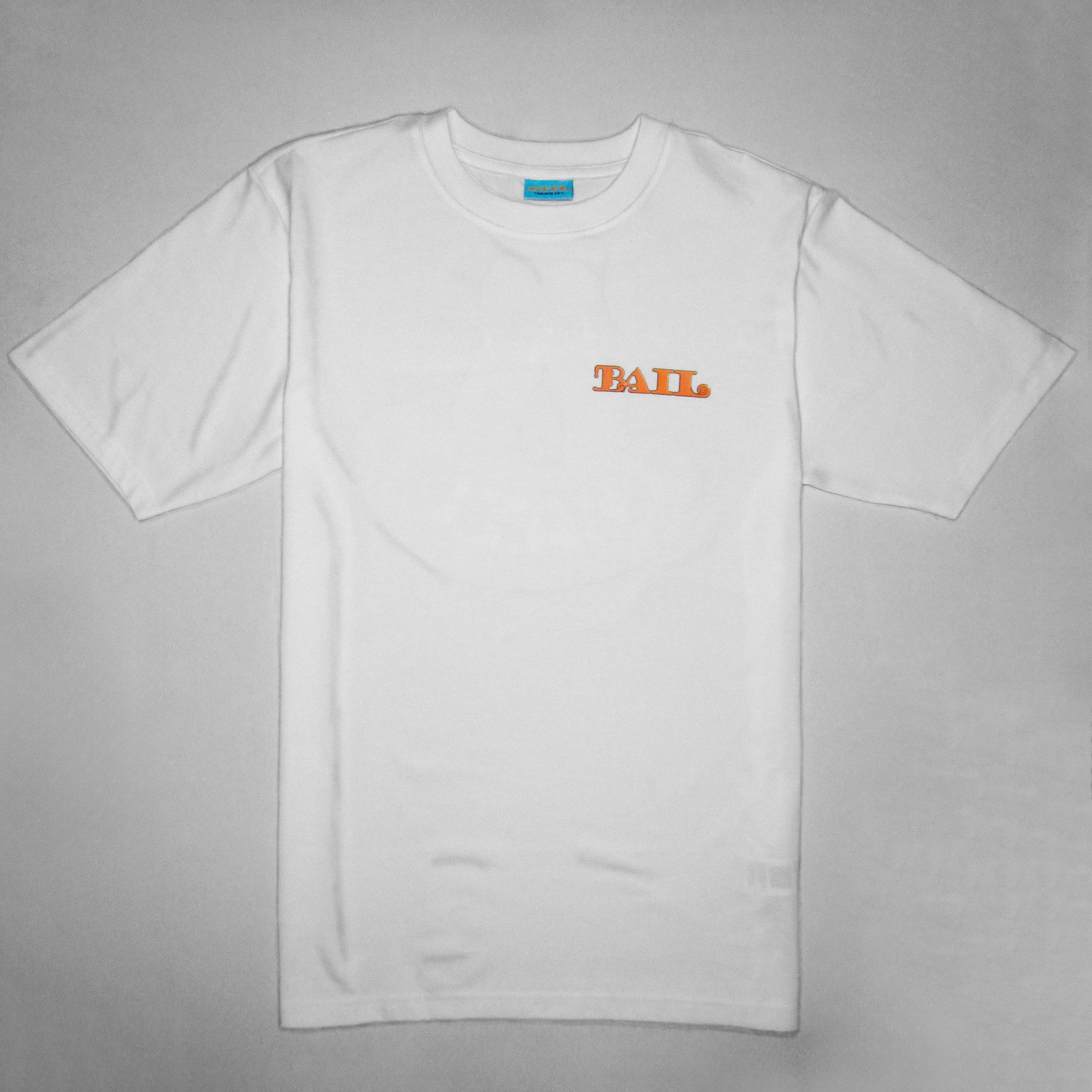 A white crew-necked T-shirt with short sleeves is displayed flat against a white background. The clothing brand's logo, "BAIL" in bold orange font, is printed in orange on the left chest, and a sky blue neck tag is slightly visible at the top of the streetwear apparel. Casual and minimalist design, conveying stylishness and simplicity.